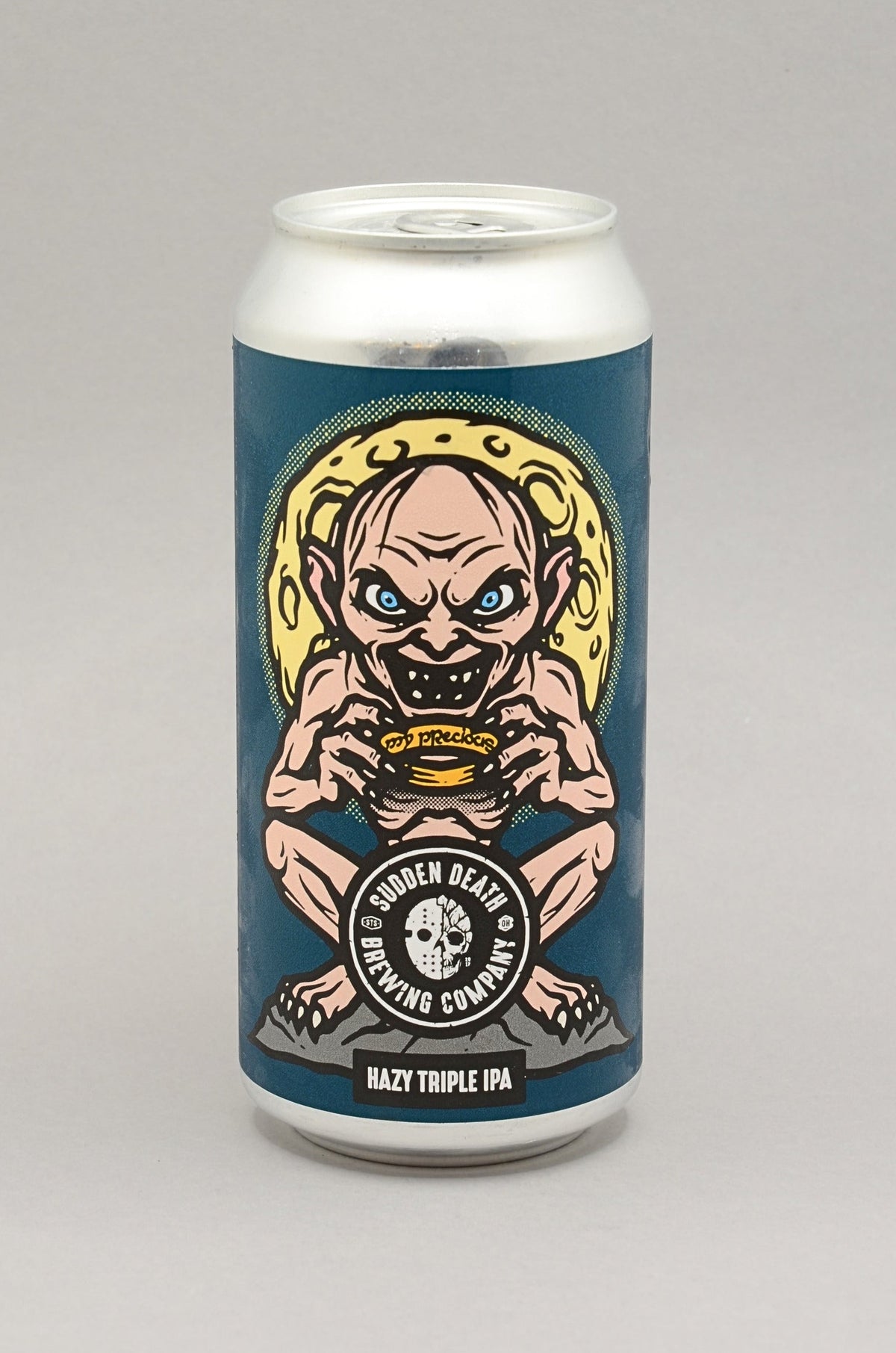 A 440ml aluminum can of Sudden Death Brewing Co. called My Precious Nelson triple IPA, featuring a dark teal label with a detailed illustration of a golum creature holding a ring, set against a neutral gray background.