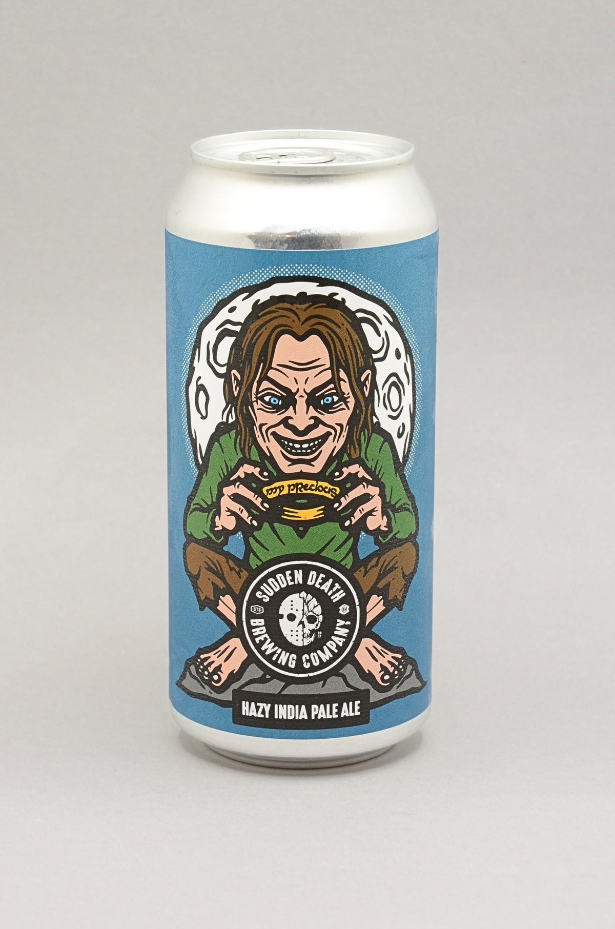 A 440ml aluminium can of Hazy India Pale Ale from Sudden Death Brewing Company, featuring a light blue label with a cartoon illustration golem holding a ring.