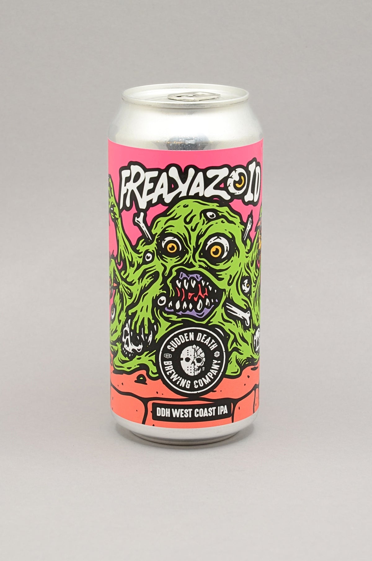 A 440ml aluminium can of Freakazoid West Coast IPA by Sudden Death Brewing, featuring a vibrant pink label with a green monster illustration, set against a neutral gray background.